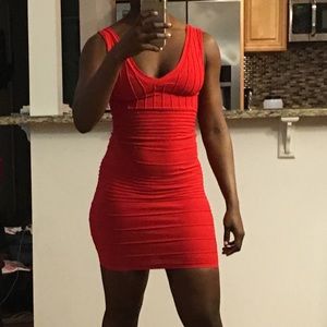 Thigh length red dress. Never worn.